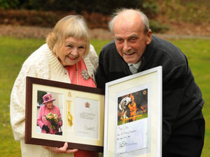 Supporting image for story: Golden couple in wedded bliss