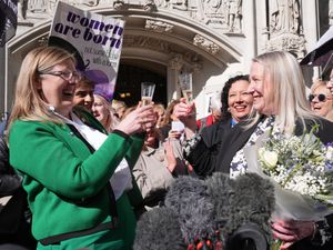 Susan smith (left) and Marion Calder, co-directors of For Women Scotland, with campaigners celebrating outside the Supreme Court