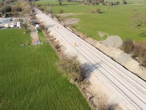 Supporting image for story: Cambrian railway line devastated by flooding set to reopen at last