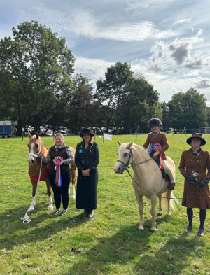 Supreme Champion - Libby with Maple and Reserve Supreme Champion - Simeon riding Kenny