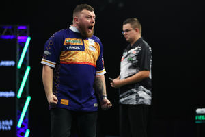 Josh Rock dumped out European champion Gian van Veen at the Mr Vegas Grand Slam of Darts on Tuesday night (Picture: Kieran Cleeves/PDC)