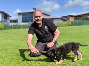 Pc John Maunders with police dog Maya