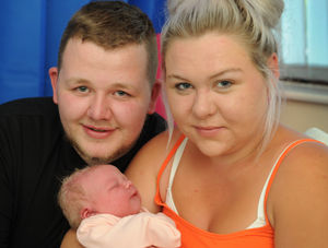 Romi-Ann with her parents Connor Turner and Paige Harker, both of Telford, at The Princess Royal Hospital