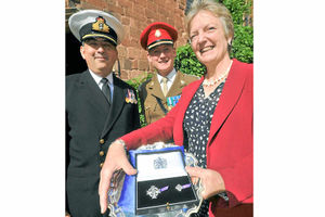 Supporting image for story: Medal is presented to Falklands widow