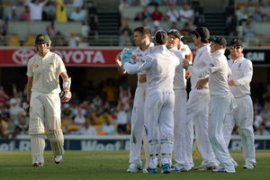 England's James Anderson (centre) celebrates taking the wicket of Australia's Peter Siddle (left)