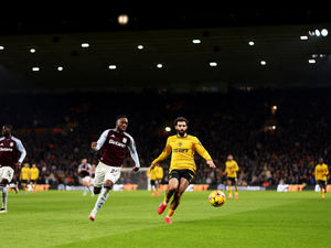 Rayan Ait-Nouri of Wolverhampton Wanderers battles for possession against Lamare Bogarde of Aston Villa (Photo by Jack Thomas - WWFC/Wolves via Getty Images)