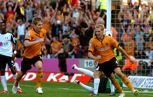 Kevin Doyle celebrates after opening the scoring against Fulham, September 2009. David Edwards (right) would also score in a 2-1 win