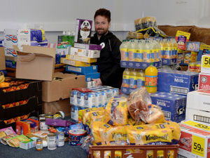 Supporting image for story: Hundreds of food parcels handed out by volunteers over Christmas