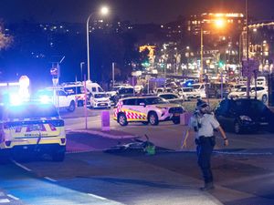 Supporting image for story: What we know so far about the Bondi Beach attack and the father and son gunmen