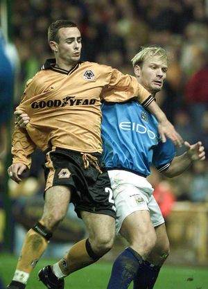 Branch in one of the incredibly baggy Wolves shirts that were all the rage for a few years.