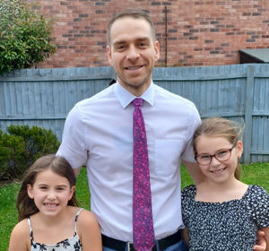 Matt with his daughters.