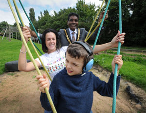 Claire Dainty at the playground with her son and late mayor Elias Mattu