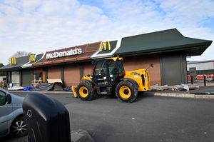 Workmen could be seen making changes to the exterior and interior of the burger shop 