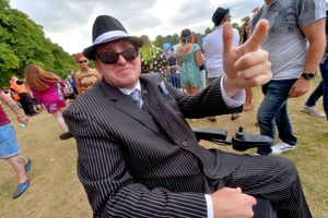 Fans got into the spirit of the occasion by dressing up in honour of the band, despite the warm weather