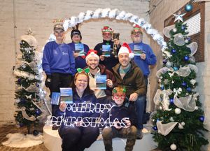 Gemma Coley, Cllr Adam Davies, Cllr Wayne Little, Lisa Mansford, Colin Pilbin, Chris Rhodes and Steve Stokes getting set up for Christmas at Delph Stables