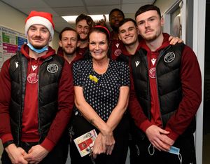 Walsall FC players visit Walsall Manor Hospital.Players with Ward Clerk Iris Hassell.