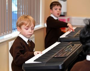 Pupils at the school can learn to play instruments and be part of a band as part of a service provided by 'I-Rock'