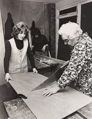 January 1973: 'Miss Cissie Watkins concentrates on a sawing operation at the ladies' woodwork classes at Cannock. She is aided by Miss Gillian Loftus. The weekly classes are part of the activities at the town's community centre and are proving popular.'