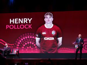 Ieuan Evans, Chair and Tour Manager of the British & Irish Lions, unveils Henry Pollock as a squad member