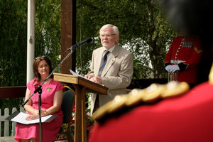 Dei Tomos speaking during the opening ceremony. Image by Andy Compton