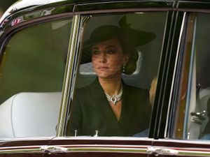 Supporting image for story: Top hats and caped detailing among garments worn by funeral guests