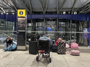 Stranded passengers at Heathrow Terminal 5 in London