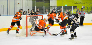 Netminder Declan Ryan under pressure in the Telford Tigers goal.  Photo: Matt Giles
