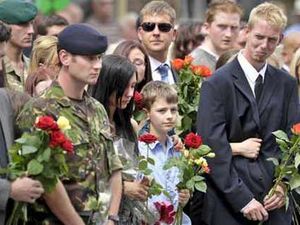Supporting image for story: Family say goodbye to Marine hero Jonathan Crookes
