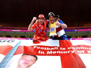 Supporting image for story: England fans pay World Cup tribute to boxing trainer who was stabbed to death