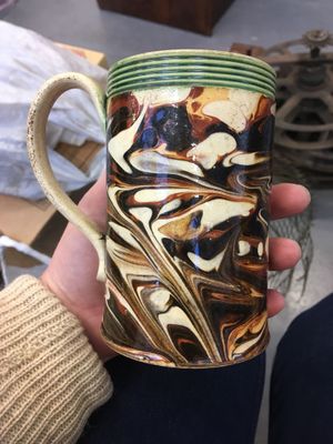 This creamware mug, circa 1790, was plucked out of a box of otherwise worthless pottery, estimated at £150-£200.