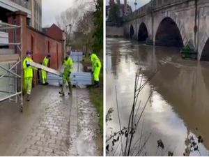 Supporting image for story: Flood barriers deployed in Shrewsbury as waters rise on the River Severn
