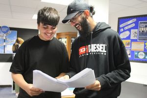 Dorian Marenda Dheensa and Ruben Boughan enjoy a laugh after the tension of waiting for their results at St Peter’s Collegiate Academy