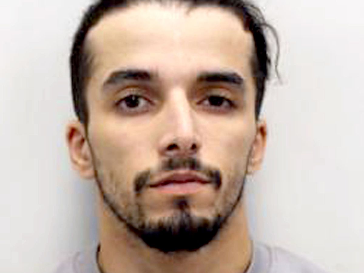 Accidentally freed prisoner locked up for biting police officers