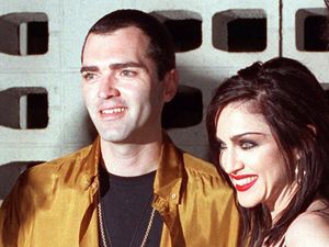 Supporting image for story: Madonna pays tribute to late brother and mother with graveside visit