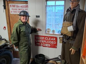 Jane Holden with the Shropshire Home Guard soldier mannequin - and unexploded bomb.