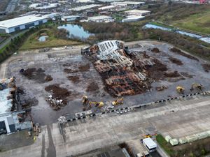 Supporting image for story: New photos show how much of former Super Smart Service building remains months after devastating fire