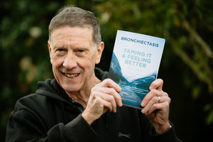 Andrew Frederick with his new book