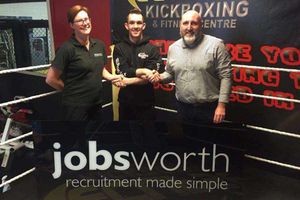 Kyle Williams welcomes new sponsors Lucy Yorke (left) and Robin Hayes (right), from Jobsworth Recruitment Solutions.
