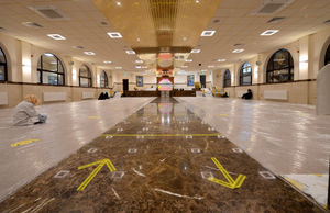 The one-way system is clearly indicated inside the prayer hall at the Gurdwara