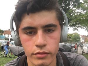 Daniel Khalife wearing headphones