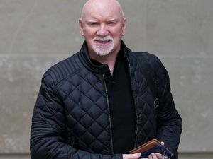 Sir Tom Hunter laughing