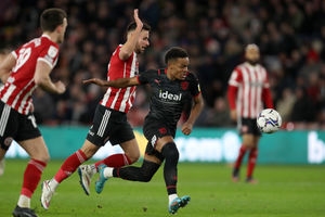 Grady Diangana of West Bromwich Albion and John Egan of Sheffield United  during the Sky Bet Championship match between Sheffield United and West Bromwich Albion at Bramall Lane on February 9, 2022 in Sheffield, England. (Photo by Adam Fradgley/West Bromwich Albion FC via Getty Images).