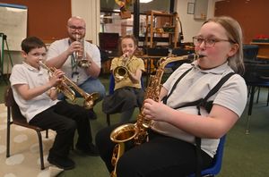Pupils enjoy free weekly music lessons. Teacher: Ben Thomas with Xavier Rogers, Demi-Leigh Dockerty and Rosie Wilcox.