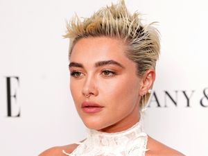 Supporting image for story: Florence Pugh hit in face by object during Comic Con event