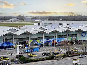 Supporting image for story: 'Get there three hours before if you want food and a drink' – Fuming airline passengers queue outside entrance to Birmingham Airport