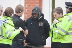 Phillip Simelane is arrested by police