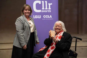 Councillor Fran Oborski receives her award from Councillor Abi Brown