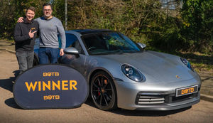 Robert Goodall, 47, a chartered surveyor from Solihull, won a luxury Porsche 911 Carrera with a 25p raffle ticket