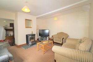 The lounge could fit another couple of armchairs, or could have big sofas instead. Photo: Rightmove.