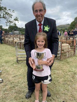 Sheep - Young Handler Lillie Dyke, with President Martin Udall